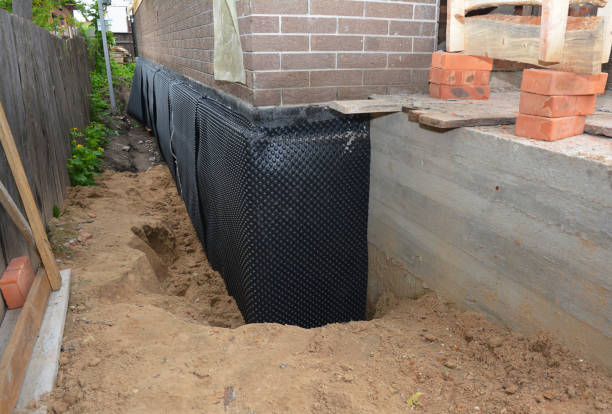 Happy homeowners after waterproofing job in Inver Grove Heights